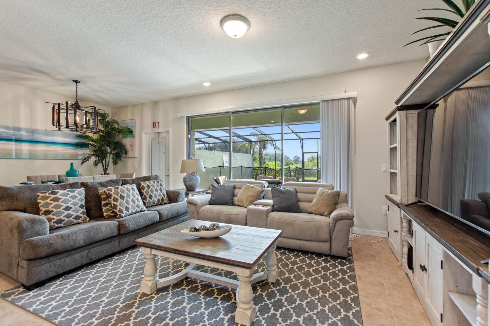 A living room with couches and tables in it