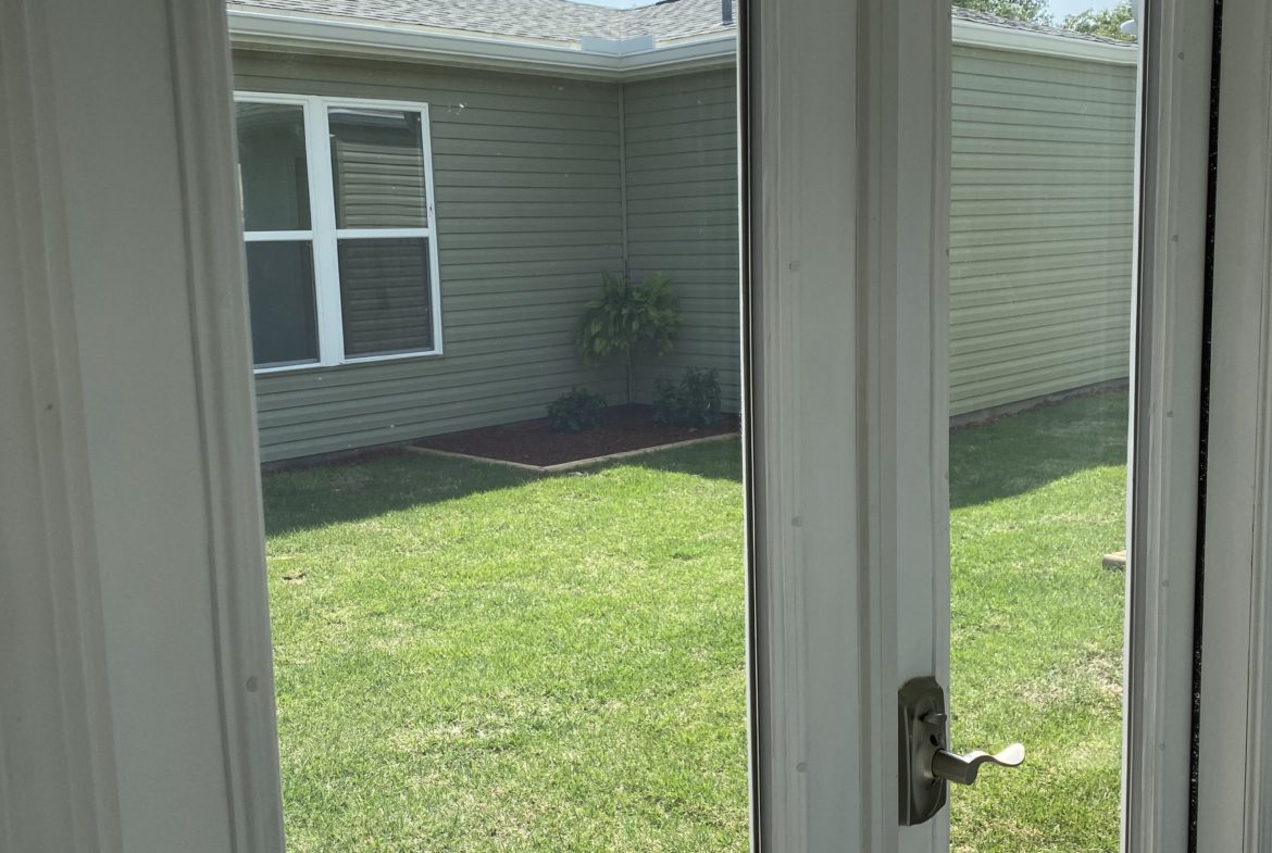 A view of the back yard from outside.